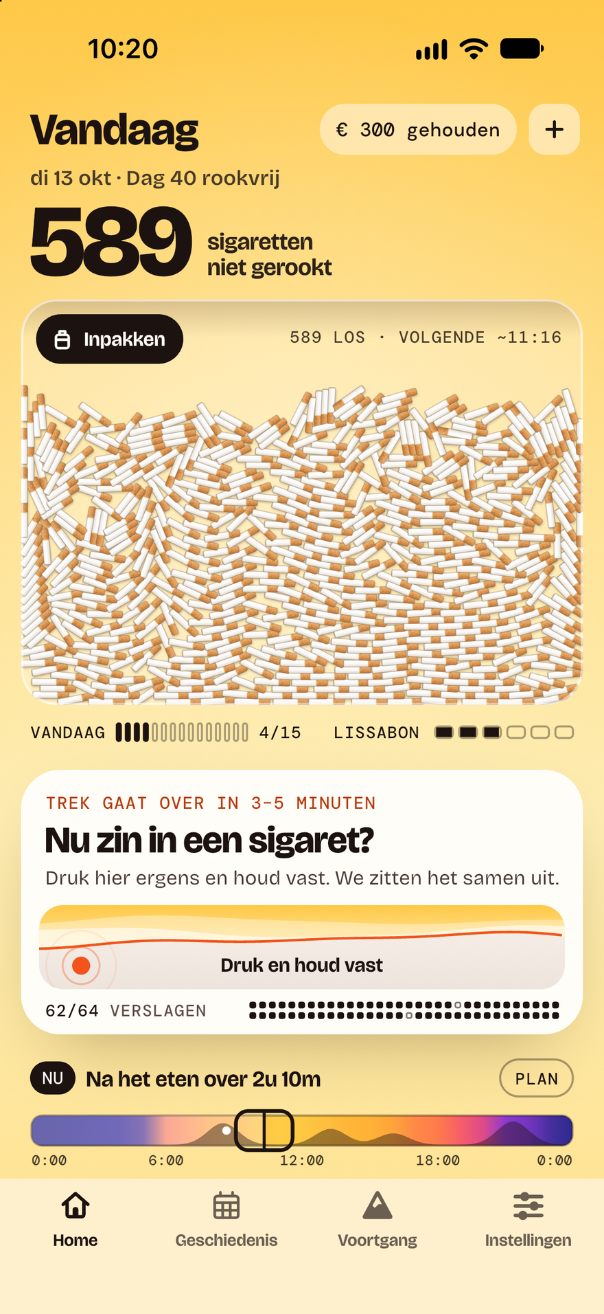 Het beginscherm van Burnout op dag 40: 589 sigaretten die je niet hebt gerookt, op een stapel in een bakje, € 300 bespaard, een kaart om ingedrukt te houden bij trek met 62 van de 64 trekmomenten doorstaan, en een strook met de riskante uren van vandaag, de volgende na het eten.